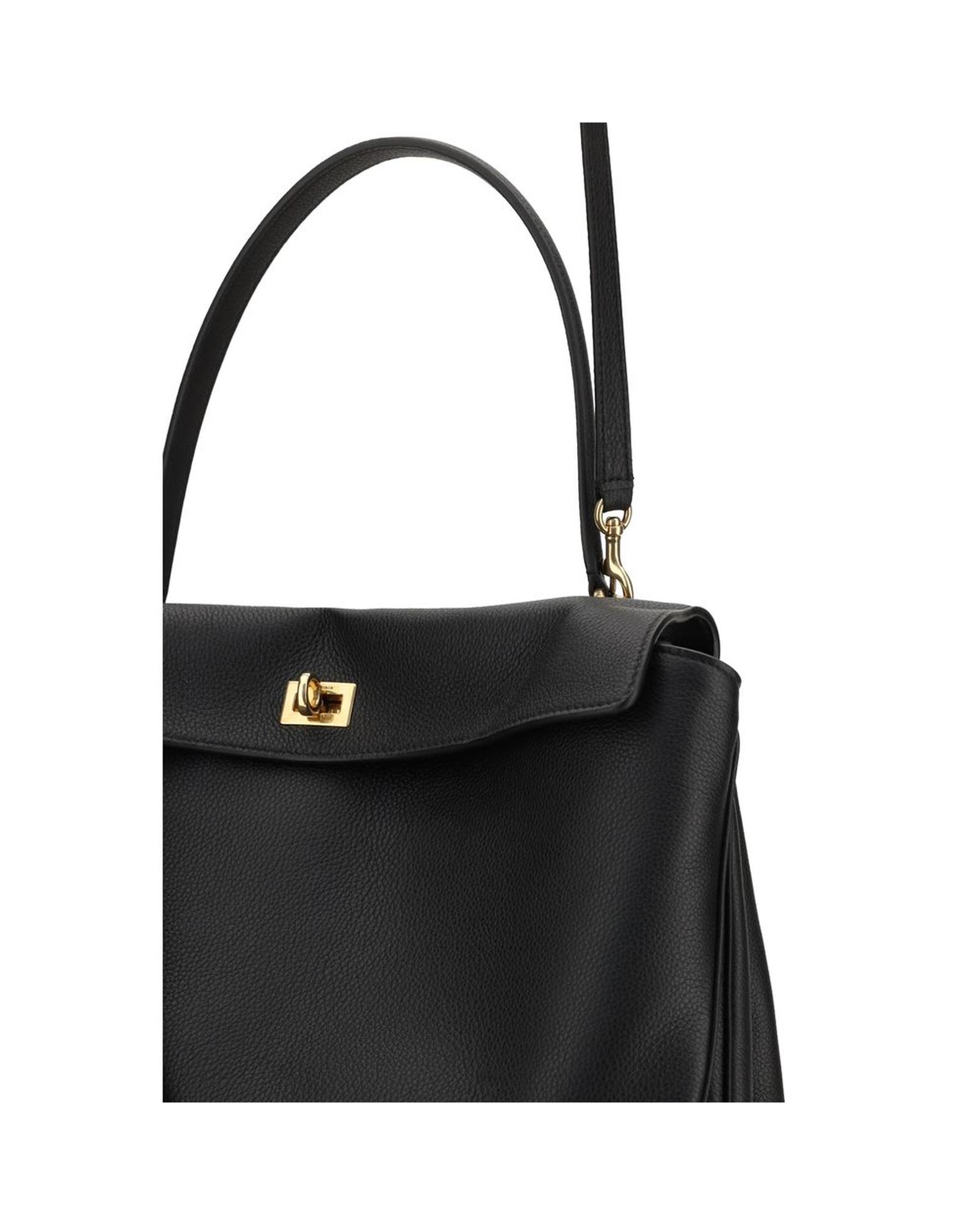 Black leather handbag with gold clasp and handle.