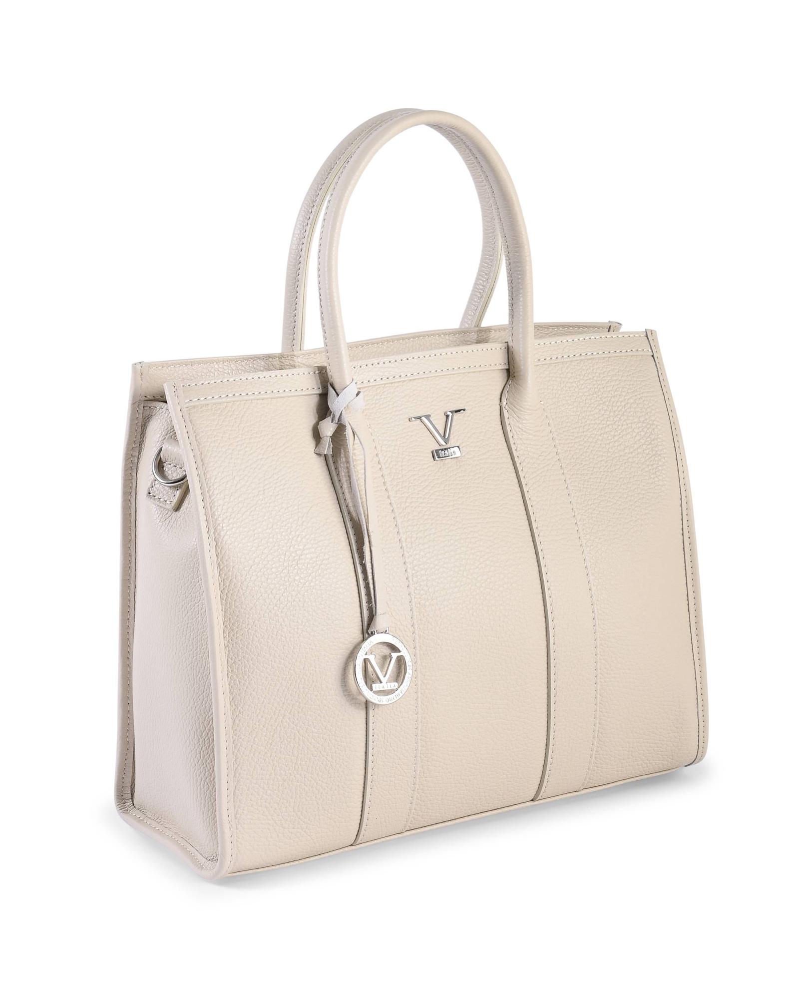 Elegant beige leather handbag with silver accents.