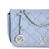 Light blue quilted handbag with gold chain