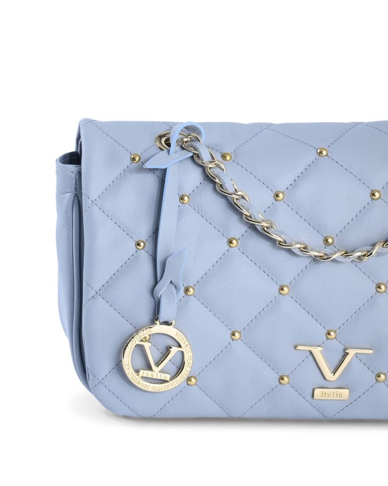 Light blue quilted handbag with gold chain