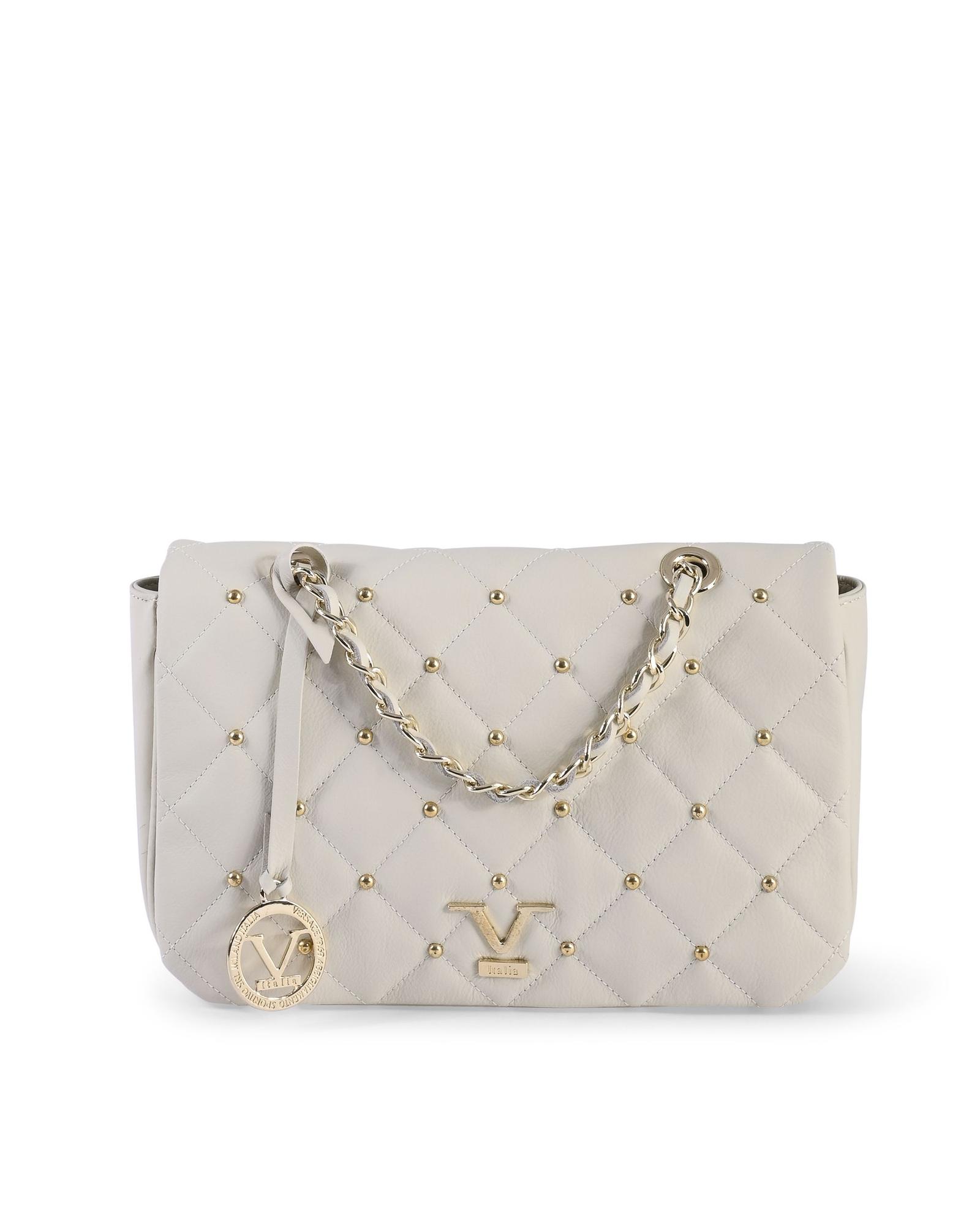White quilted handbag with gold chain details.