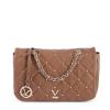 v539 btb109400 202506160302 00.jpg Brown quilted handbag with gold chain accents.