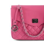 Pink quilted handbag with chain strap.