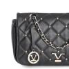 v italia by versace chain bag black leather Black quilted handbag with gold accents and chain.