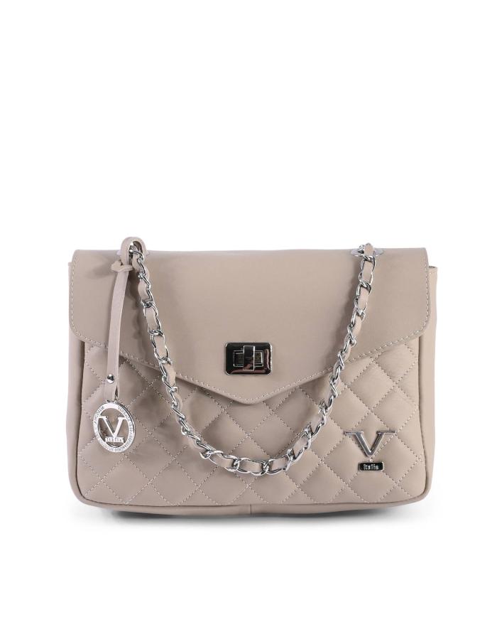 Quilted beige handbag with chain strap.