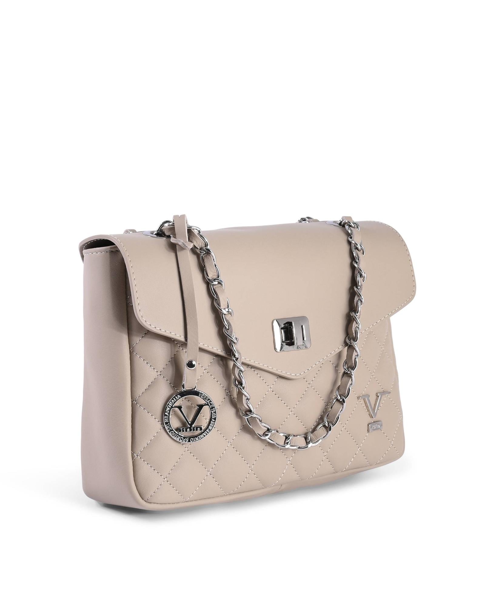 Beige quilted leather handbag with chain strap.