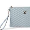 v italia by versace 1969 abbigliamento sportivo srl vitalia clutch light blue Light blue quilted wristlet handbag with chevron pattern.