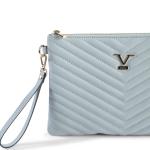 Light blue quilted wristlet handbag with chevron pattern.