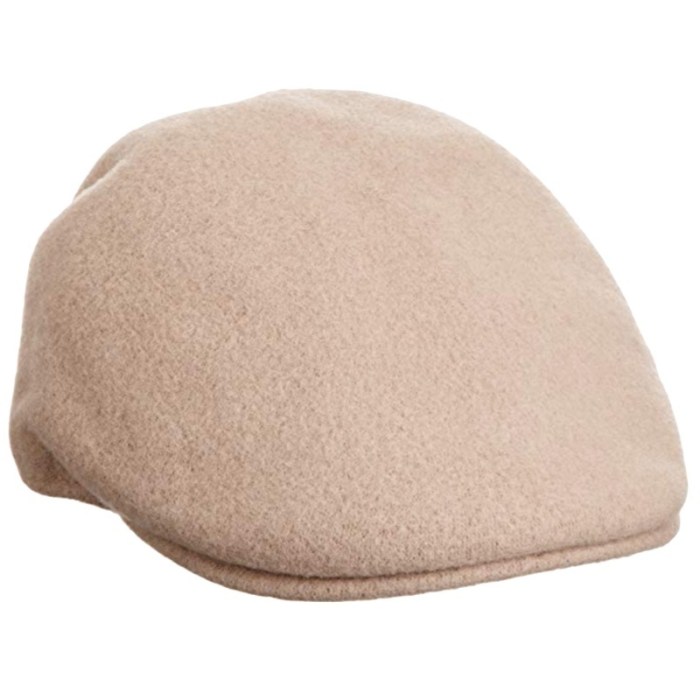Beige wool flat cap hat, isolated on white background.