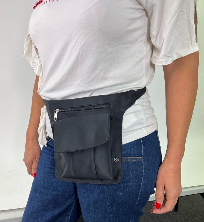pierre cardin inspired milleni luggage bag large in blue + free milleni waist bag Woman wearing black belt bag with zip pocket.