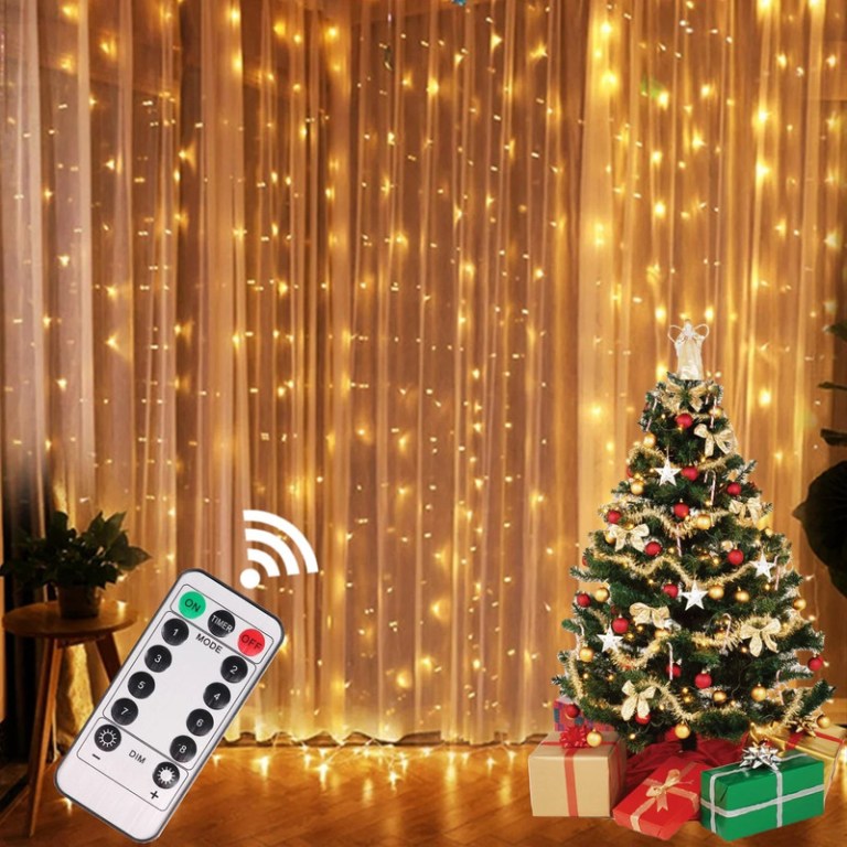 Christmas tree with gifts and fairy lights.