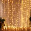 Fairy lights on curtain create warm, cosy ambiance.