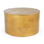 Round golden hammered metal coffee table
