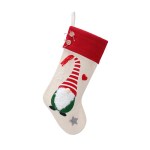 Festive stocking with gnome and decorations