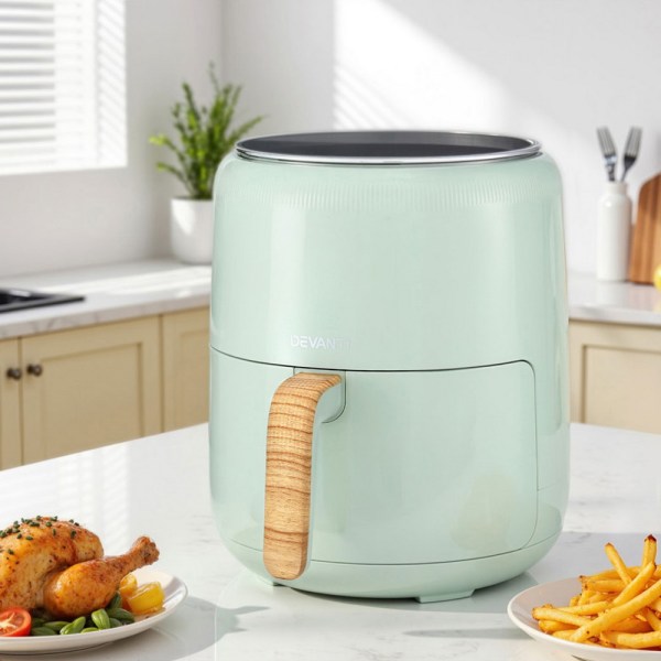 Green air fryer in modern kitchen