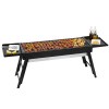 bbq b smoker drawer 202506101046 00.jpg Outdoor barbecue grill with skewers and condiments.