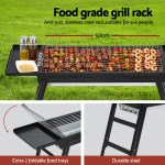 Stainless steel barbecue grill with foldable trays.