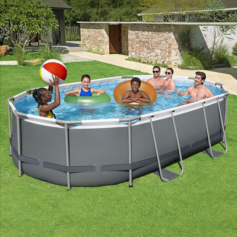 bestway 488x305x107cm swimming pool steel frame set w/ pump filter ladder cover Group playing in above-ground pool with inflatable rings.