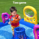 bestway kids inflatable play splash pool with slide ball tossing toys coral basket Child playing with toss game in inflatable pool.