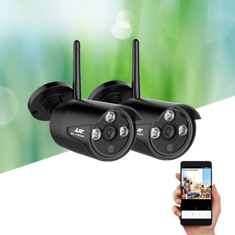 Two wireless security cameras with mobile phone display.