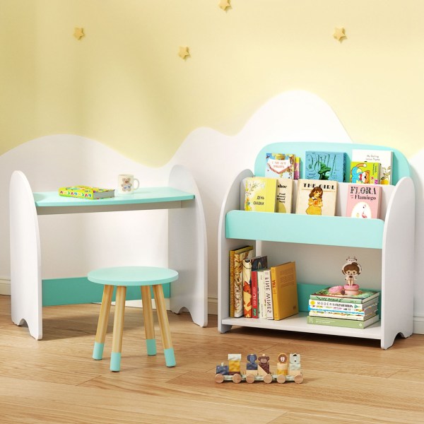 Children's playroom with books, table, and toys.