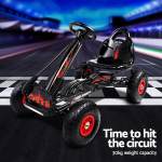 rigo kids pedal go kart ride on toys racing car rubber tyre black Black go-kart on racetrack, 30kg capacity.