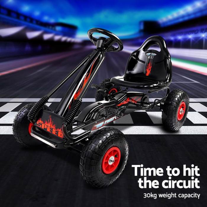 rigo kids pedal go kart ride on toys racing car rubber tyre black Black go-kart on racetrack, 30kg capacity.
