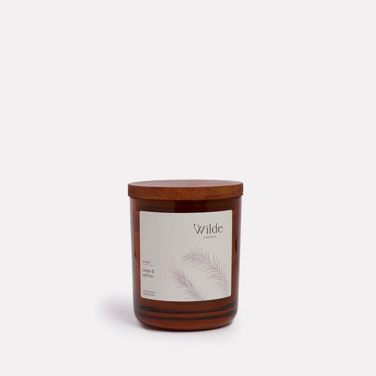 Wilde Aroma cedar saffron candle with wooden lid.