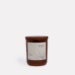 wilde aroma oakmoss & orange candle (copy) Amber candle with wooden lid, labelled honeysuckle bushflower.