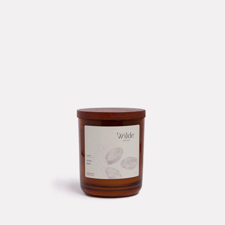 Wilde Aroma Tonka Bean candle with wooden lid.