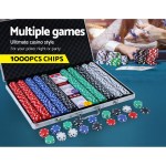 Poker chips set with cards and case on table.