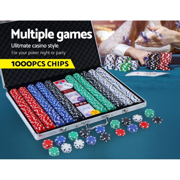 Poker chips set with cards and case on table.