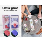 Two sets of classic playing cards on table.