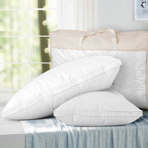pillow dfd wallx2 202502281434 00.jpg Two white pillows on light blue fabric
