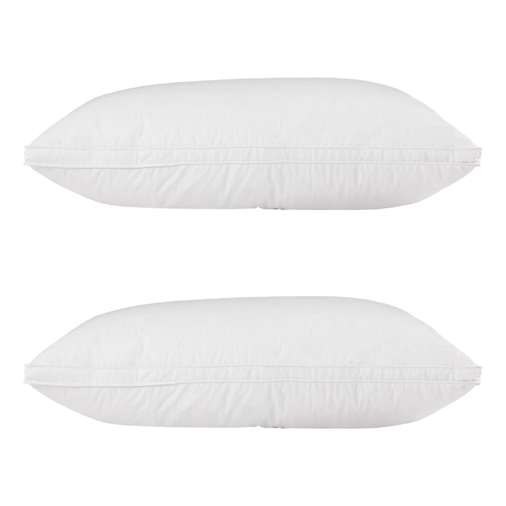Two white pillows stacked horizontally