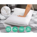 giselle bedding duck feather down pillow twin pack Soft, feather-filled pillow with hand pressing down.