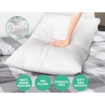 giselle bedding goose feather down pillow luxury twin pack White pillow with goose feather filling on bed.