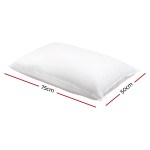 White pillow dimensions 75cm by 50cm.