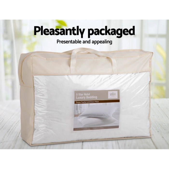 giselle bedding goose feather down pillow twin pack Luxury bedding in transparent packaging on table.