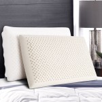 Two latex pillows on a bed