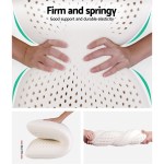 Hands squeezing firm, elastic latex pillow.