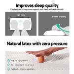 Natural latex pillow supports head, neck; zero pressure.