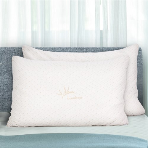 pillow mefo bam s 202502281436 00.jpg Two bamboo pillows on a bed.