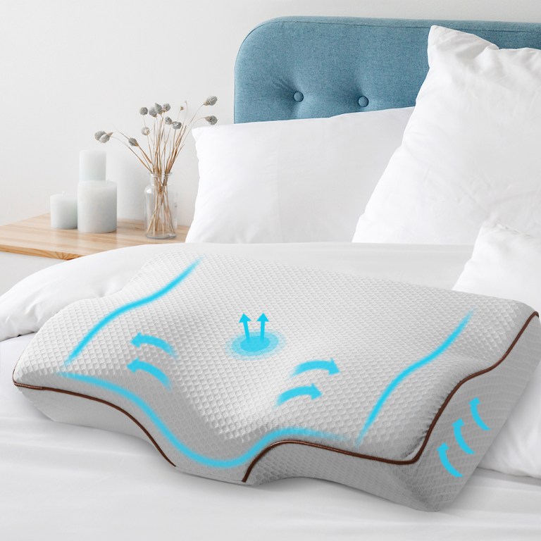 Ergonomic pillow with airflow design on bed.