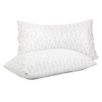Two white geometric patterned pillows