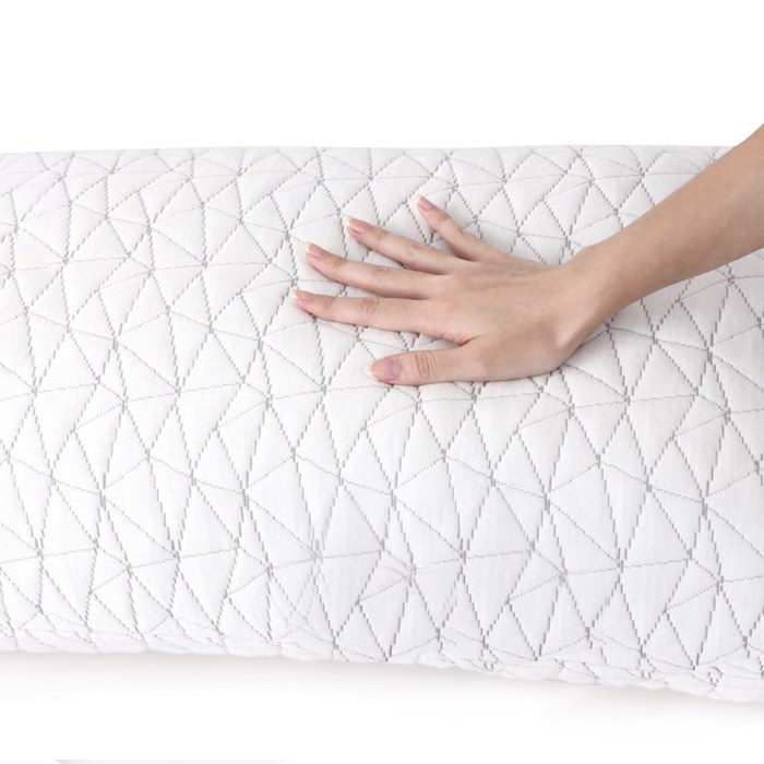 giselle bedding memory foam pillow single size twin pack Hand on quilted white pillow.