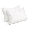 giselle bedding memory foam pillow single size twin pack Two white geometric patterned pillows.
