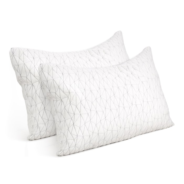 giselle bedding memory foam pillow single size twin pack Two white geometric patterned pillows.