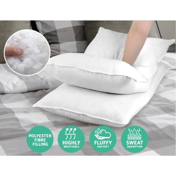Soft, breathable polyester pillows on bed.