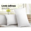 giselle bedding 4 pack bed pillow family hotel 48x73cm Soft white pillows on a cosy bed.